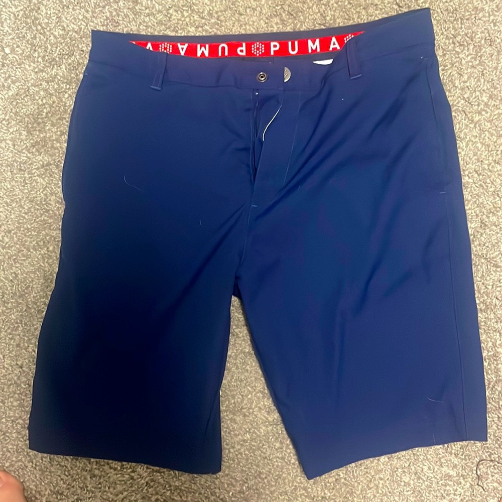 Blue Puma golf shorts. Size 32 waist. Like new.